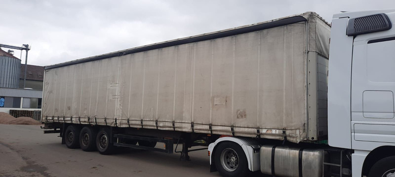 Schmitz Cargobull 3-Achser Pritsche Plane - Semi-trailer dengan terpal samping: gambar 1 Schmitz Cargobull 3-Achser Pritsche Plane - Semi-trailer dengan terpal samping: gambar 1