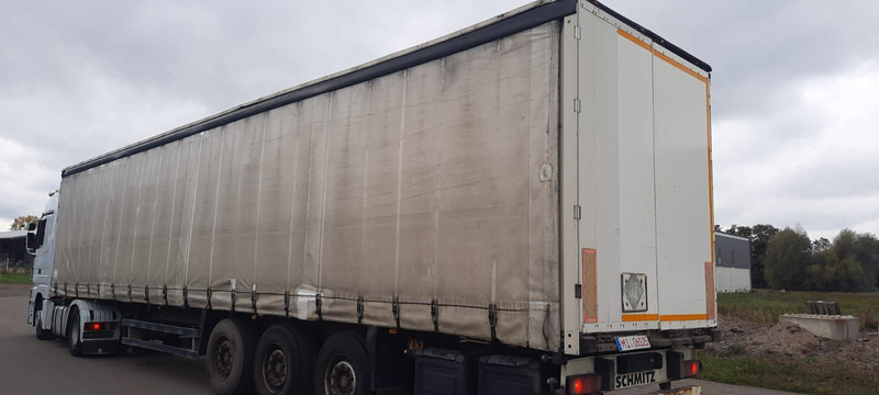 Schmitz Cargobull 3-Achser Pritsche Plane - Semi-trailer dengan terpal samping: gambar 2 Schmitz Cargobull 3-Achser Pritsche Plane - Semi-trailer dengan terpal samping: gambar 2