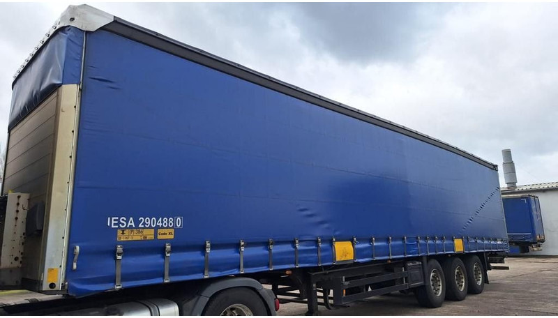 Schmitz Cargobull Pritsche Plane Bahn,Steckrungen - Semi-trailer dengan terpal samping: gambar 2 Schmitz Cargobull Pritsche Plane Bahn,Steckrungen - Semi-trailer dengan terpal samping: gambar 2