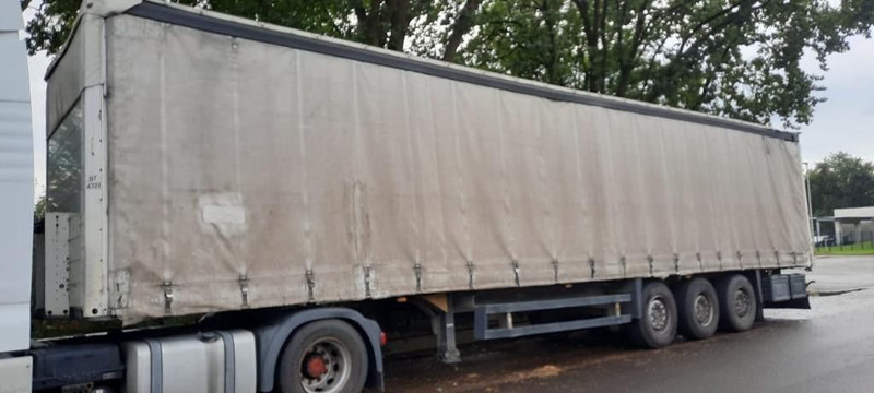 Schmitz Cargobull Pritsche Plane - Semi-trailer dengan terpal samping: gambar 1 Schmitz Cargobull Pritsche Plane - Semi-trailer dengan terpal samping: gambar 1