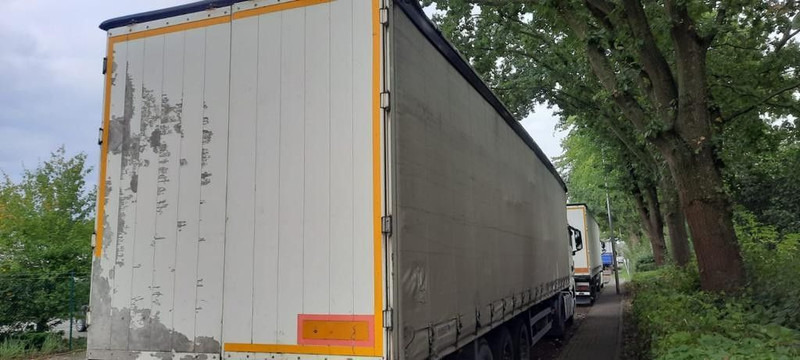 Schmitz Cargobull Pritsche Plane - Semi-trailer dengan terpal samping: gambar 3 Schmitz Cargobull Pritsche Plane - Semi-trailer dengan terpal samping: gambar 3