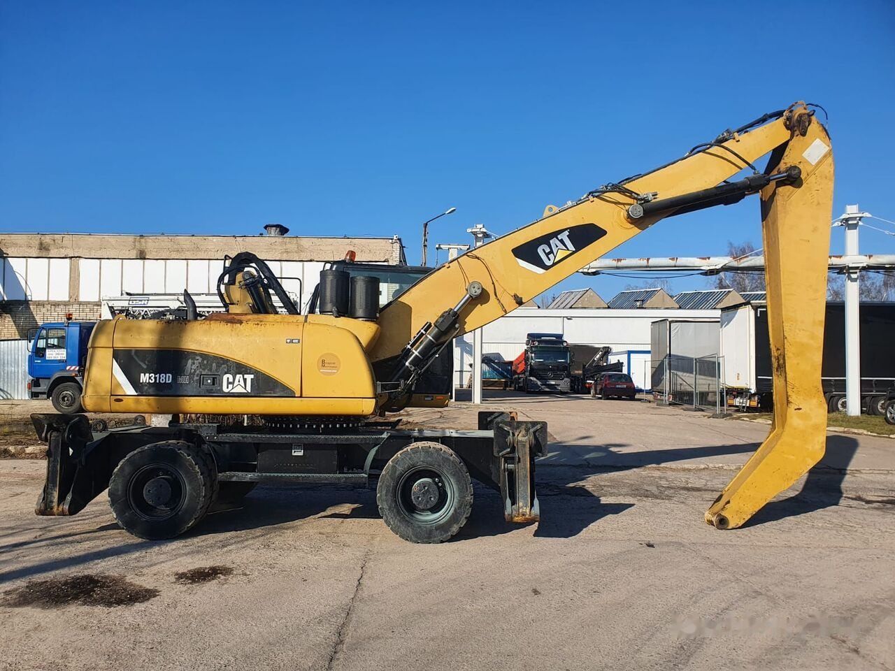 Mesin pengisi Caterpillar 318 D MH: gambar 8