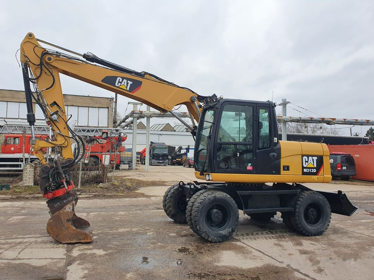Caterpillar M 313 D Tiltrotator - Ekskavator roda: gambar 2 Caterpillar M 313 D Tiltrotator - Ekskavator roda: gambar 2