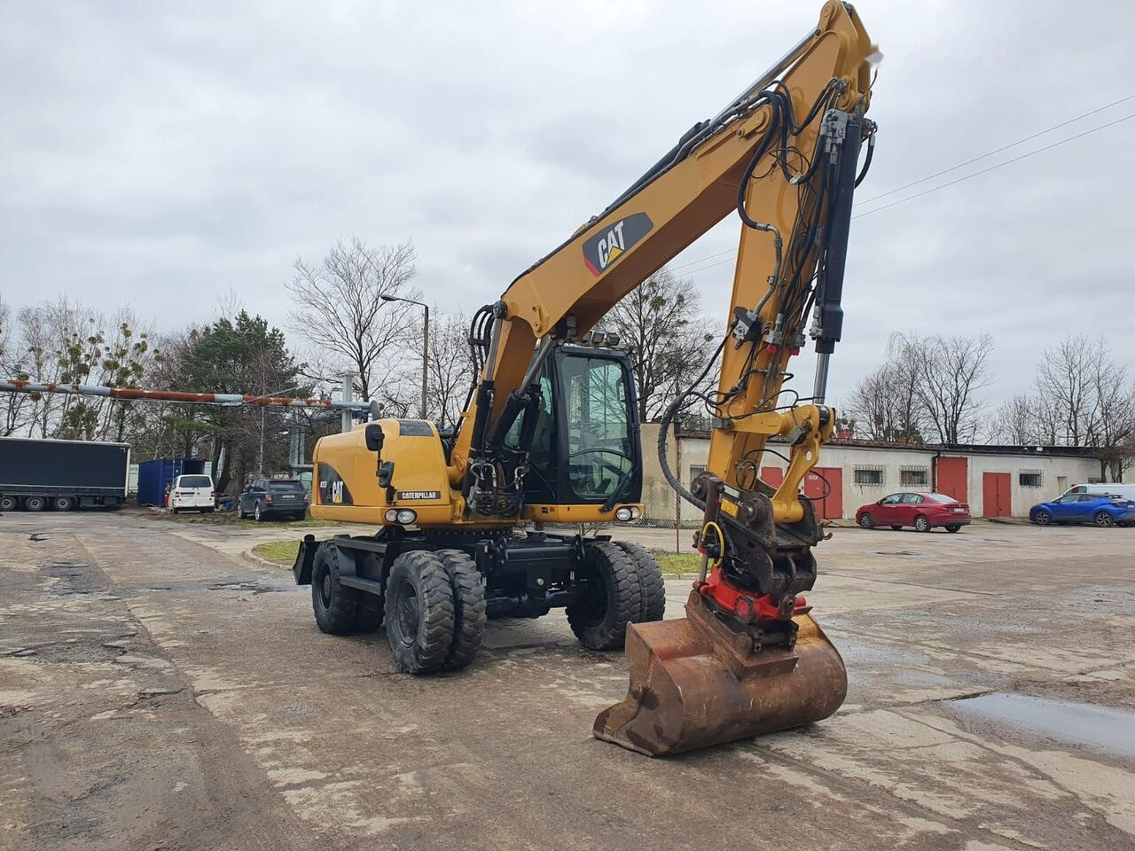 Caterpillar M 313 D Tiltrotator - Ekskavator roda: gambar 5 Caterpillar M 313 D Tiltrotator - Ekskavator roda: gambar 5