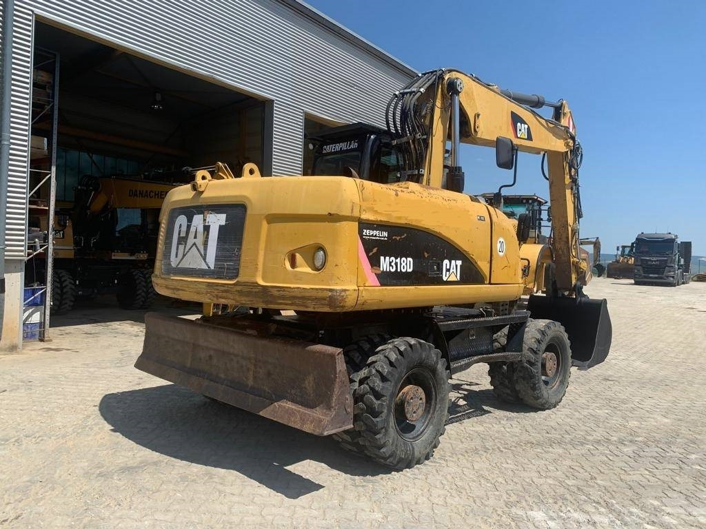 CAT M 318 D - Ekskavator roda: gambar 5 CAT M 318 D - Ekskavator roda: gambar 5