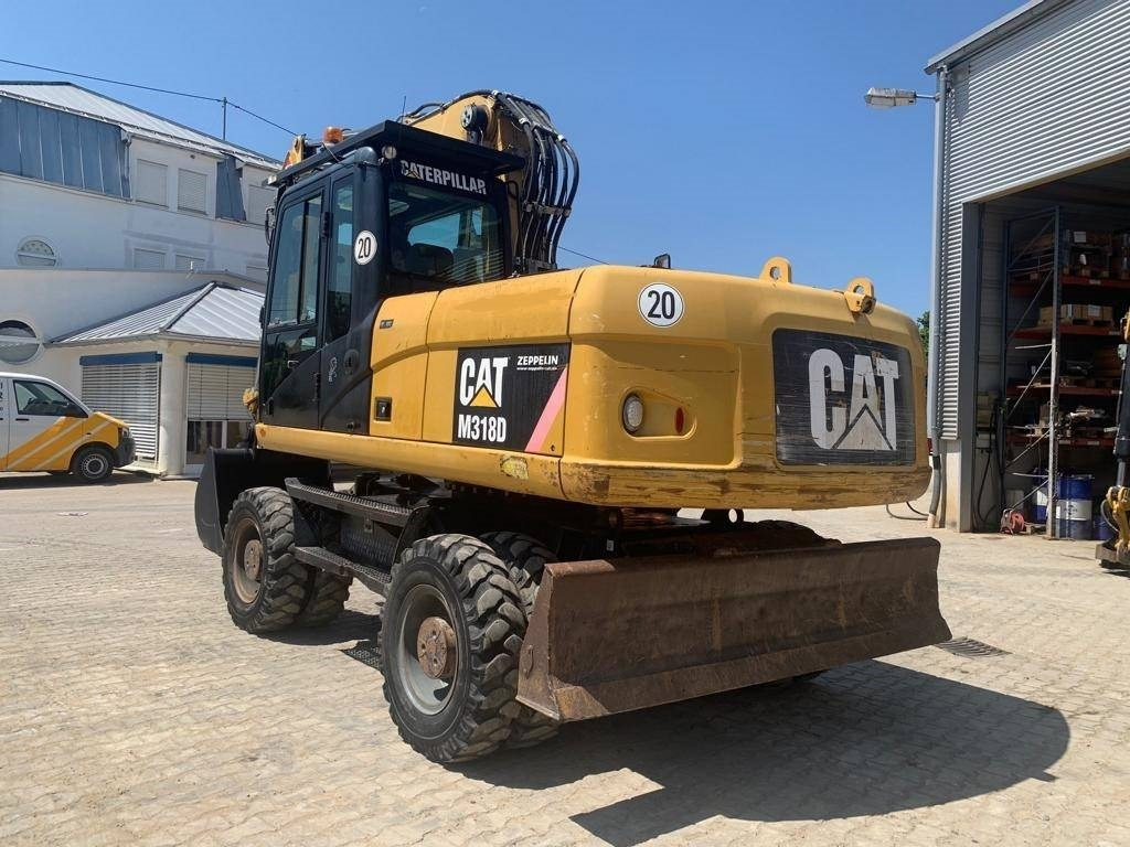 CAT M 318 D - Ekskavator roda: gambar 3 CAT M 318 D - Ekskavator roda: gambar 3