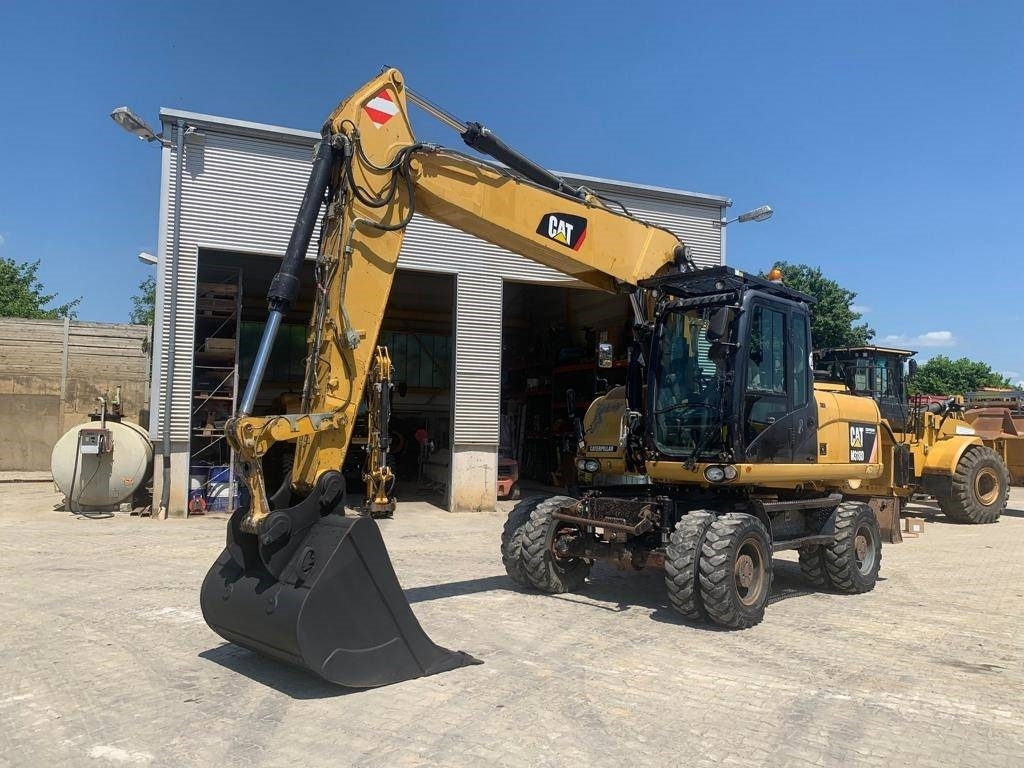CAT M 318 D - Ekskavator roda: gambar 1 CAT M 318 D - Ekskavator roda: gambar 1