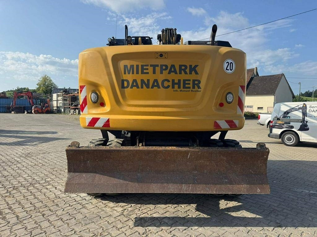 CAT M 318 F - Ekskavator roda: gambar 4 CAT M 318 F - Ekskavator roda: gambar 4