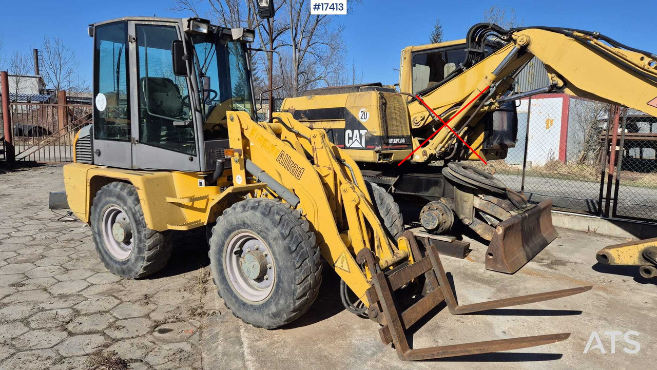 Wheel loader AHLMANN AL 85t 2004) forks, quick coupler, opening bucket. - Wheel loader: gambar 4 Wheel loader AHLMANN AL 85t 2004) forks, quick coupler, opening bucket. - Wheel loader: gambar 4
