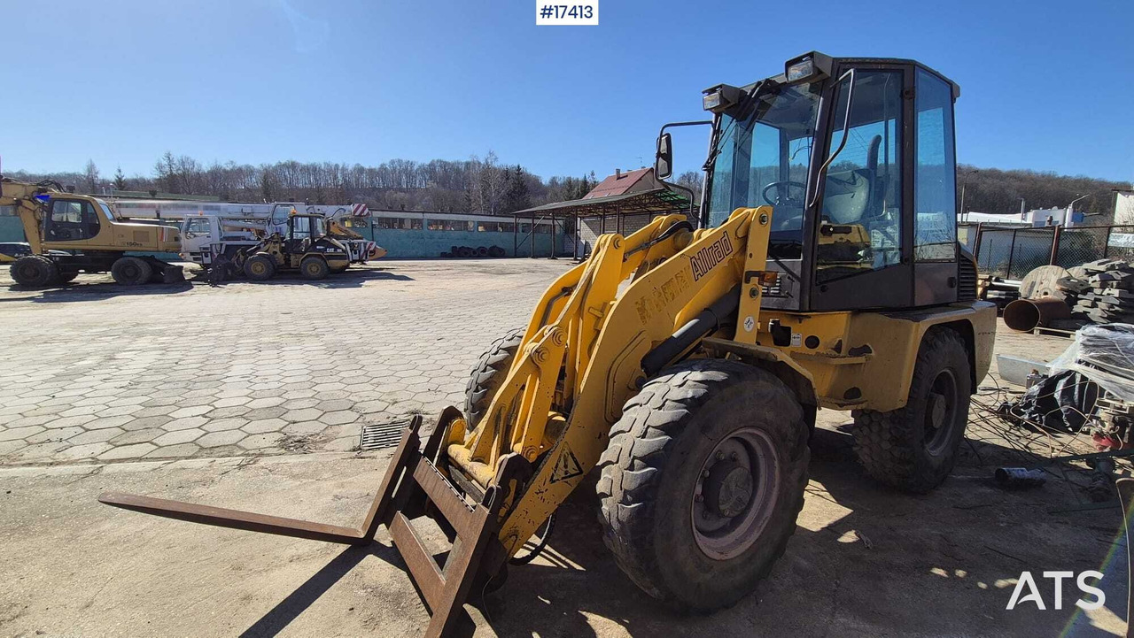 Wheel loader AHLMANN AL 85t 2004) forks, quick coupler, opening bucket. - Wheel loader: gambar 1 Wheel loader AHLMANN AL 85t 2004) forks, quick coupler, opening bucket. - Wheel loader: gambar 1