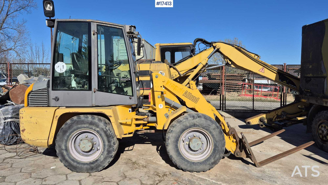 Wheel loader AHLMANN AL 85t 2004) forks, quick coupler, opening bucket. - Wheel loader: gambar 5 Wheel loader AHLMANN AL 85t 2004) forks, quick coupler, opening bucket. - Wheel loader: gambar 5