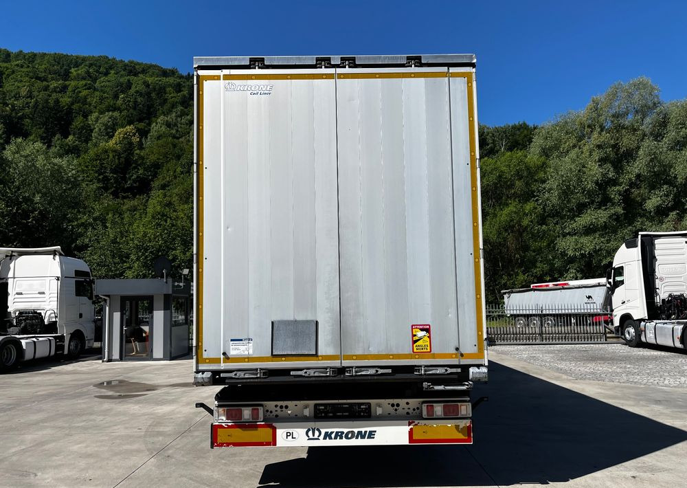 Krone Firanka Coilmulde // 9m // Alu Drzwi // Ażury // Oś podnoszona // - Semi-trailer dengan terpal samping: gambar 2 Krone Firanka Coilmulde // 9m // Alu Drzwi // Ażury // Oś podnoszona // - Semi-trailer dengan terpal samping: gambar 2