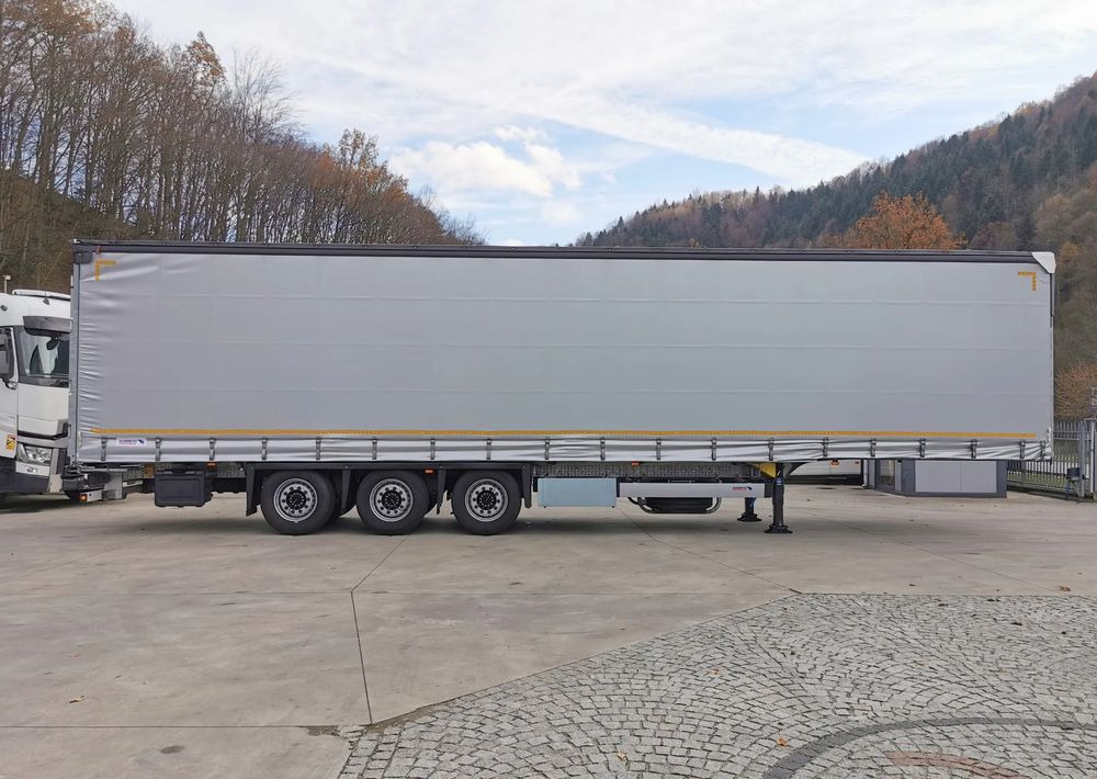 Schmitz Cargobull MEGA VARIOS + BDE - Semi-trailer dengan terpal samping: gambar 4 Schmitz Cargobull MEGA VARIOS + BDE - Semi-trailer dengan terpal samping: gambar 4
