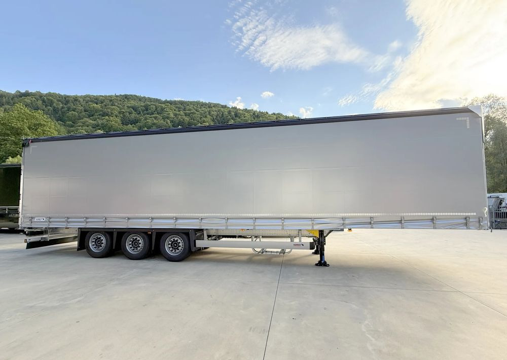 Schmitz Cargobull MEGA VARIOS + BDE - Semi-trailer dengan terpal samping: gambar 3 Schmitz Cargobull MEGA VARIOS + BDE - Semi-trailer dengan terpal samping: gambar 3