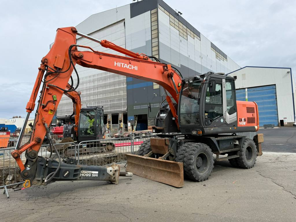 Hitachi ZX 140 W-3 - Ekskavator roda: gambar 1 Hitachi ZX 140 W-3 - Ekskavator roda: gambar 1