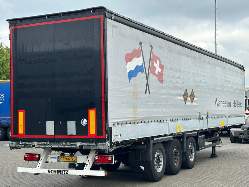Schmitz Cargobull Schuifzeil met Borden / Disc-Brakes / Huckepack / Code XL / Apk - Semi-trailer dengan terpal samping: gambar 1 Schmitz Cargobull Schuifzeil met Borden / Disc-Brakes / Huckepack / Code XL / Apk - Semi-trailer dengan terpal samping: gambar 1