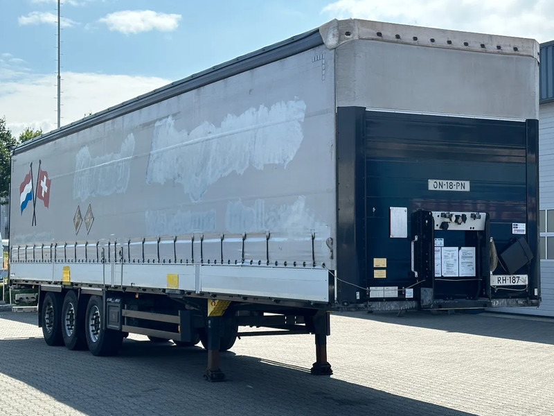 Schmitz Cargobull Schuifzeil met Borden / Disc-Brakes / Huckepack / Code XL - Semi-trailer dengan terpal samping: gambar 4 Schmitz Cargobull Schuifzeil met Borden / Disc-Brakes / Huckepack / Code XL - Semi-trailer dengan terpal samping: gambar 4