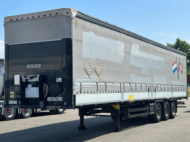 Schmitz Cargobull Schuifzeil met Borden / Disc-Brakes / Huckepack / Code XL - Semi-trailer dengan terpal samping: gambar 3 Schmitz Cargobull Schuifzeil met Borden / Disc-Brakes / Huckepack / Code XL - Semi-trailer dengan terpal samping: gambar 3