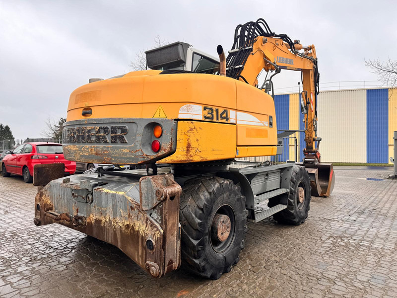 Liebherr A 314 Litronic . - Ekskavator roda: gambar 3 Liebherr A 314 Litronic . - Ekskavator roda: gambar 3