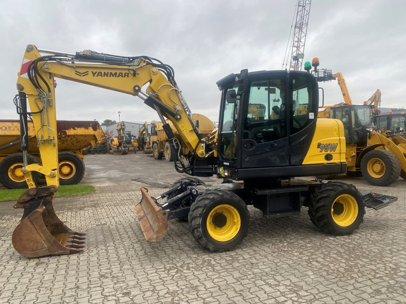 Yanmar B95w NVT - Ekskavator roda: gambar 1 Yanmar B95w NVT - Ekskavator roda: gambar 1