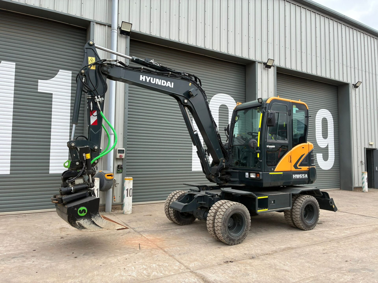 Hyundai HW65AH Ex Demo - Ekskavator roda: gambar 1 Hyundai HW65AH Ex Demo - Ekskavator roda: gambar 1