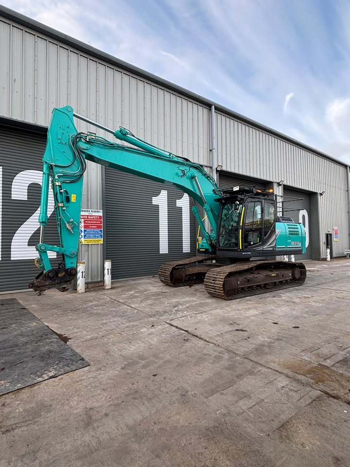 Kobelco SK210LC-11 - Ekskavator perayap: gambar 1 Kobelco SK210LC-11 - Ekskavator perayap: gambar 1