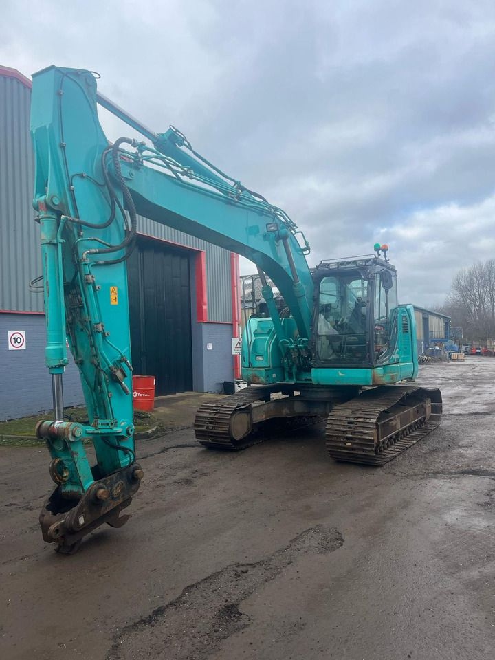 Kobelco SK230SRLC-5E - Ekskavator perayap: gambar 1 Kobelco SK230SRLC-5E - Ekskavator perayap: gambar 1