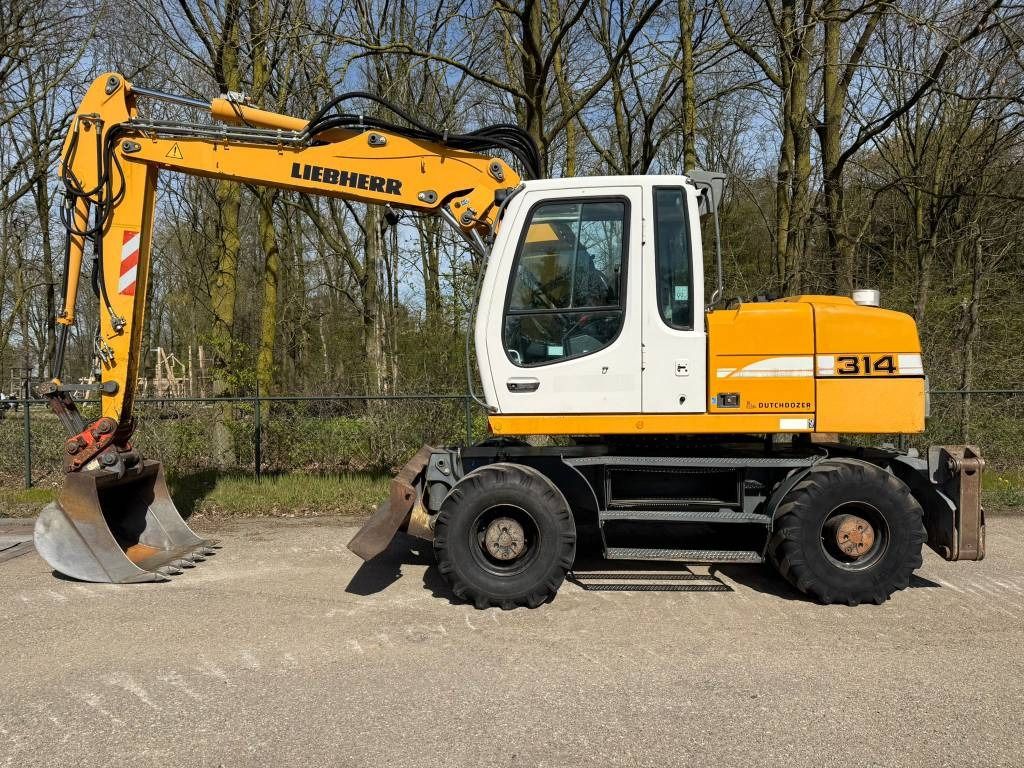 Liebherr A 314 Litronic - Ekskavator roda: gambar 2 Liebherr A 314 Litronic - Ekskavator roda: gambar 2