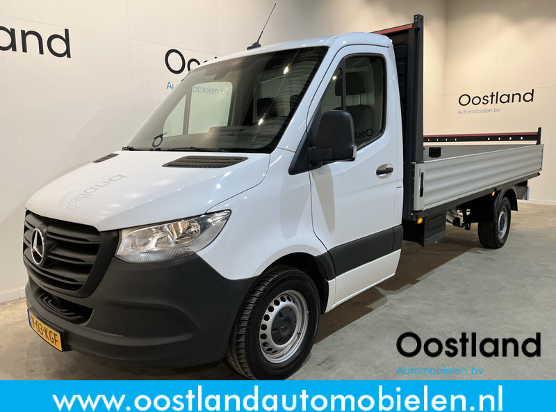 Mercedes-Benz Sprinter 315 CDI L3 RWD Open Laadbak / Euro 6 / Airco / MBUX / CarPlay / Navigatie / 3-Zits / 75.200 KM !! / BPM VRIJ !! - Van flatbed: gambar 1 Mercedes-Benz Sprinter 315 CDI L3 RWD Open Laadbak / Euro 6 / Airco / MBUX / CarPlay / Navigatie / 3-Zits / 75.200 KM !! / BPM VRIJ !! - Van flatbed: gambar 1