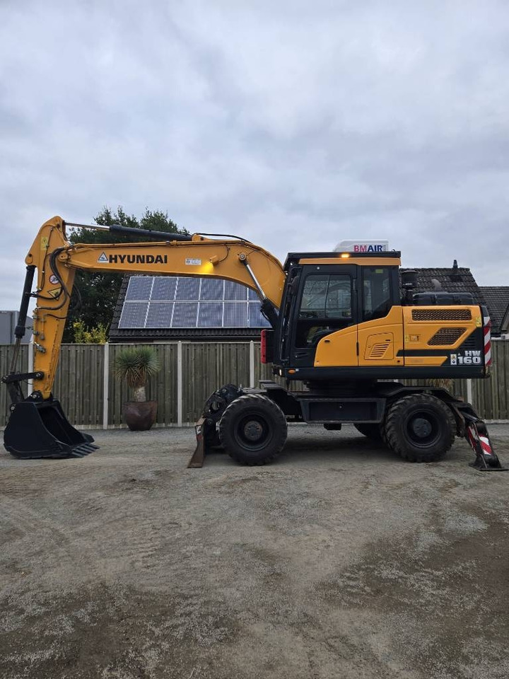 Hyundai HW 160  - Ekskavator roda: gambar 1 Hyundai HW 160  - Ekskavator roda: gambar 1