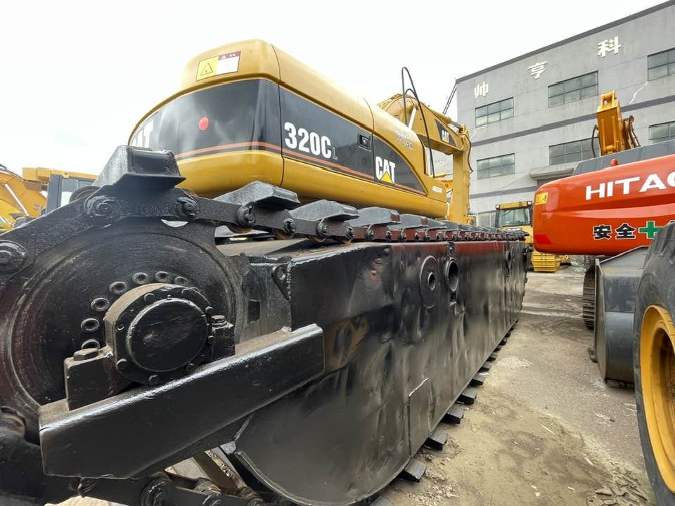 Caterpillar 320CL - Ekskavator: gambar 2 Caterpillar 320CL - Ekskavator: gambar 2