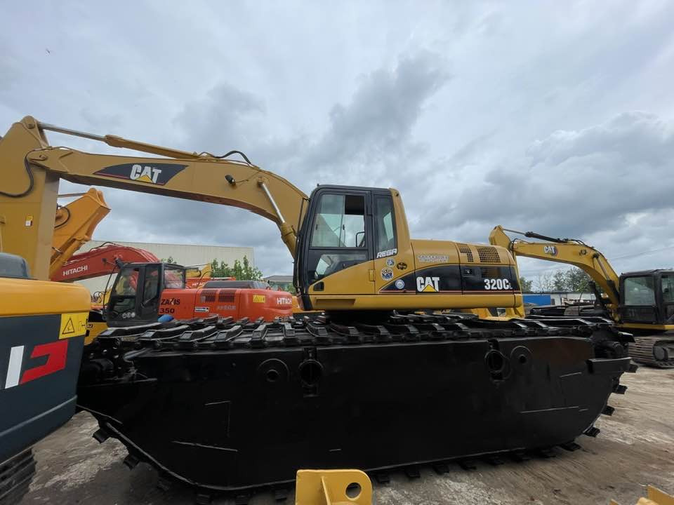 Caterpillar 320CL - Ekskavator: gambar 1 Caterpillar 320CL - Ekskavator: gambar 1