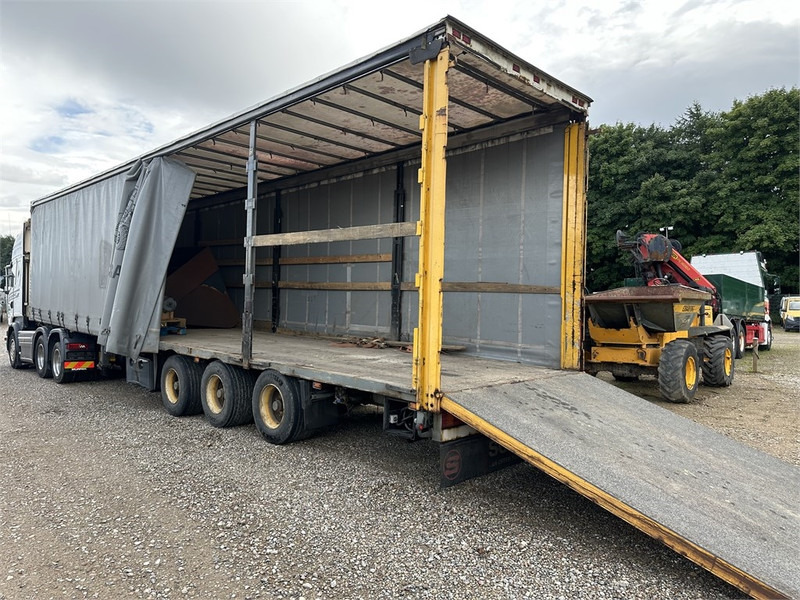 Schmitz Cargobull Machine transport trailer with bag ramp - Semi-trailer: gambar 3 Schmitz Cargobull Machine transport trailer with bag ramp - Semi-trailer: gambar 3