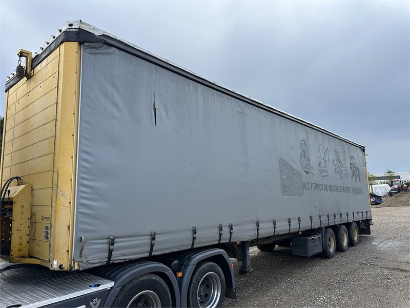 Schmitz Cargobull Machine transport trailer with bag ramp - Semi-trailer: gambar 4 Schmitz Cargobull Machine transport trailer with bag ramp - Semi-trailer: gambar 4