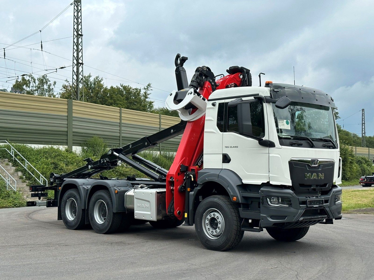 MAN TGS 33.440 6x4 Epsilon 170Z MultiLift 20s56 - Hook lift, Truk derek: gambar 1 MAN TGS 33.440 6x4 Epsilon 170Z MultiLift 20s56 - Hook lift, Truk derek: gambar 1