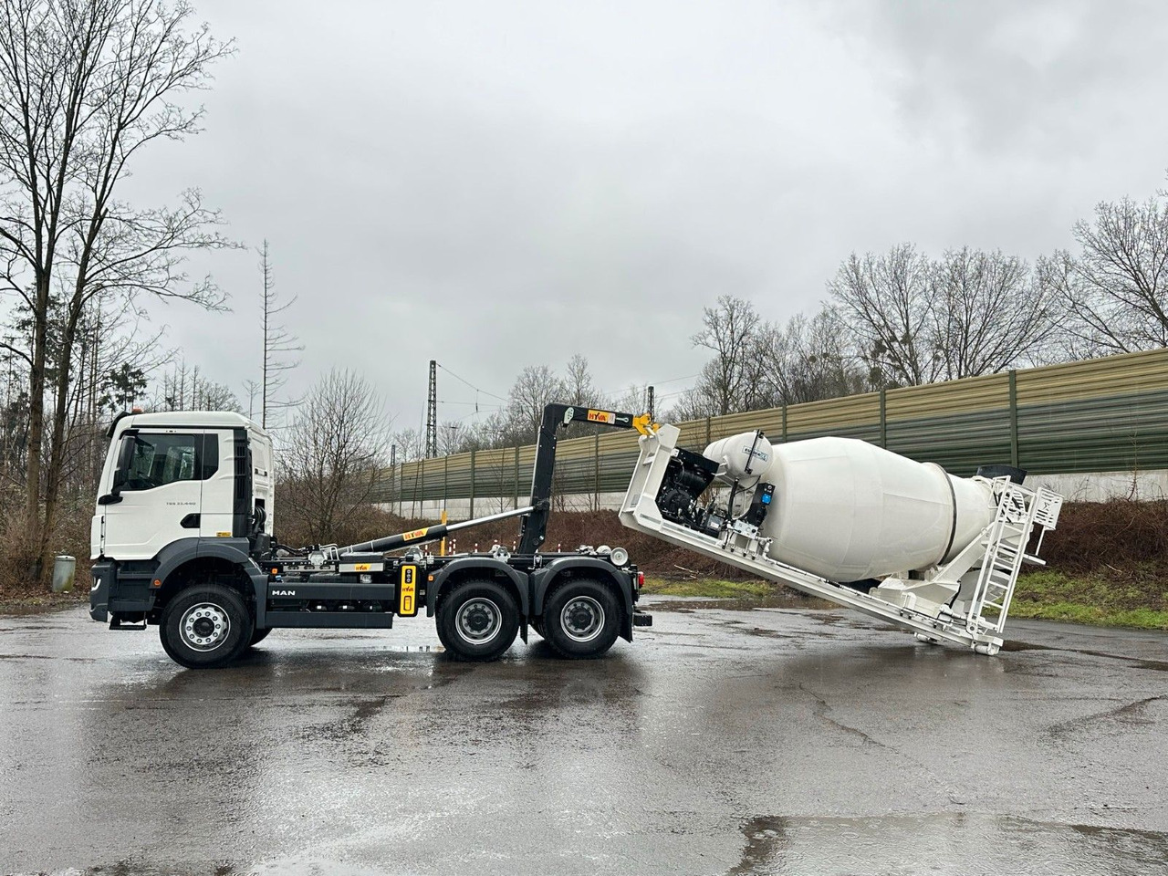 MAN TGS 33.440 6x4 Euro6e Abroller + Fahrmischer - Hook lift, Truk derek: gambar 1 MAN TGS 33.440 6x4 Euro6e Abroller + Fahrmischer - Hook lift, Truk derek: gambar 1