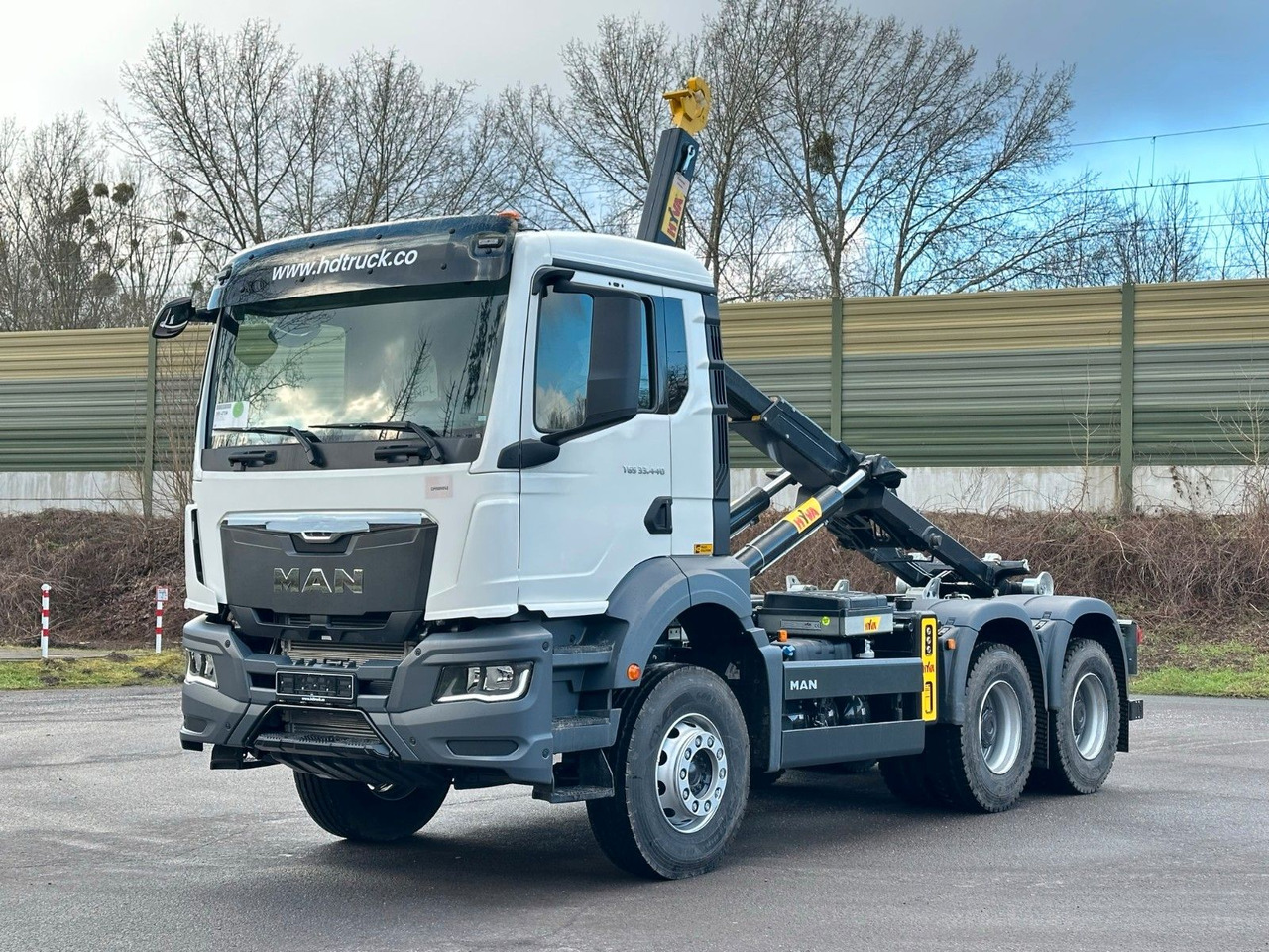 MAN TGS 33.440 6x4 Euro6e Abrollkipper Hyva - Hook lift, Truk derek: gambar 1 MAN TGS 33.440 6x4 Euro6e Abrollkipper Hyva - Hook lift, Truk derek: gambar 1