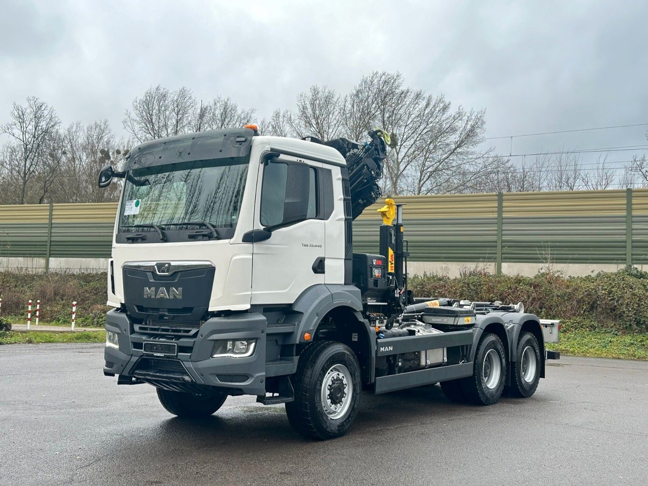 MAN TGS 33.440 6x6 BB Abrollkipper+Kran Hiab 228-6 - Hook lift, Truk derek: gambar 2 MAN TGS 33.440 6x6 BB Abrollkipper+Kran Hiab 228-6 - Hook lift, Truk derek: gambar 2
