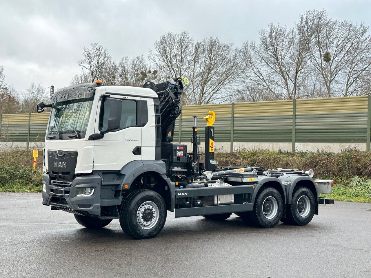 MAN TGS 33.440 6x6 BB Abrollkipper+Kran Hiab 228-6 - Hook lift, Truk derek: gambar 3 MAN TGS 33.440 6x6 BB Abrollkipper+Kran Hiab 228-6 - Hook lift, Truk derek: gambar 3