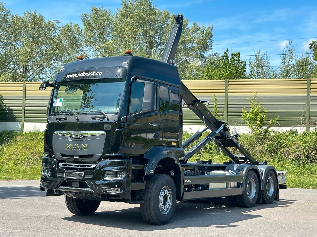 MAN TGS 33.520 6X4 Euro6e Abrollkipper MULTILIFT - Hook lift, Truk derek: gambar 1 MAN TGS 33.520 6X4 Euro6e Abrollkipper MULTILIFT - Hook lift, Truk derek: gambar 1