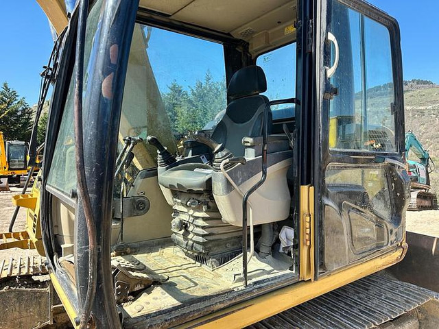 Ekskavator Caterpillar 311C: gambar 7