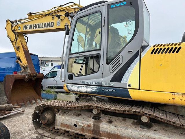 Ekskavator New Holland E215B: gambar 18
