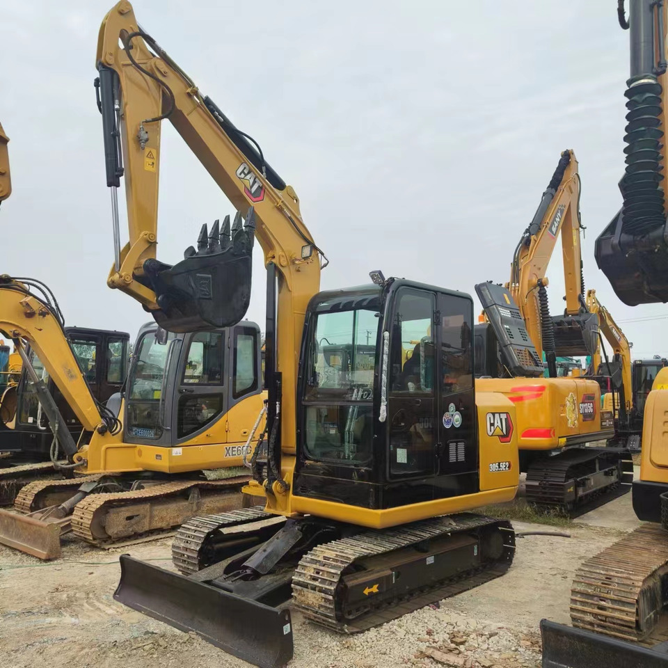 CATERPILLAR 305.5E2 - Ekskavator perayap: gambar 1 CATERPILLAR 305.5E2 - Ekskavator perayap: gambar 1