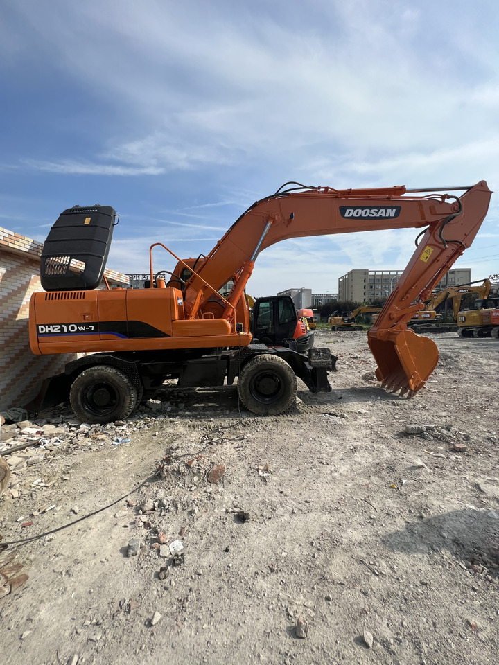 DOOSAN DX210 - Ekskavator roda: gambar 2 DOOSAN DX210 - Ekskavator roda: gambar 2