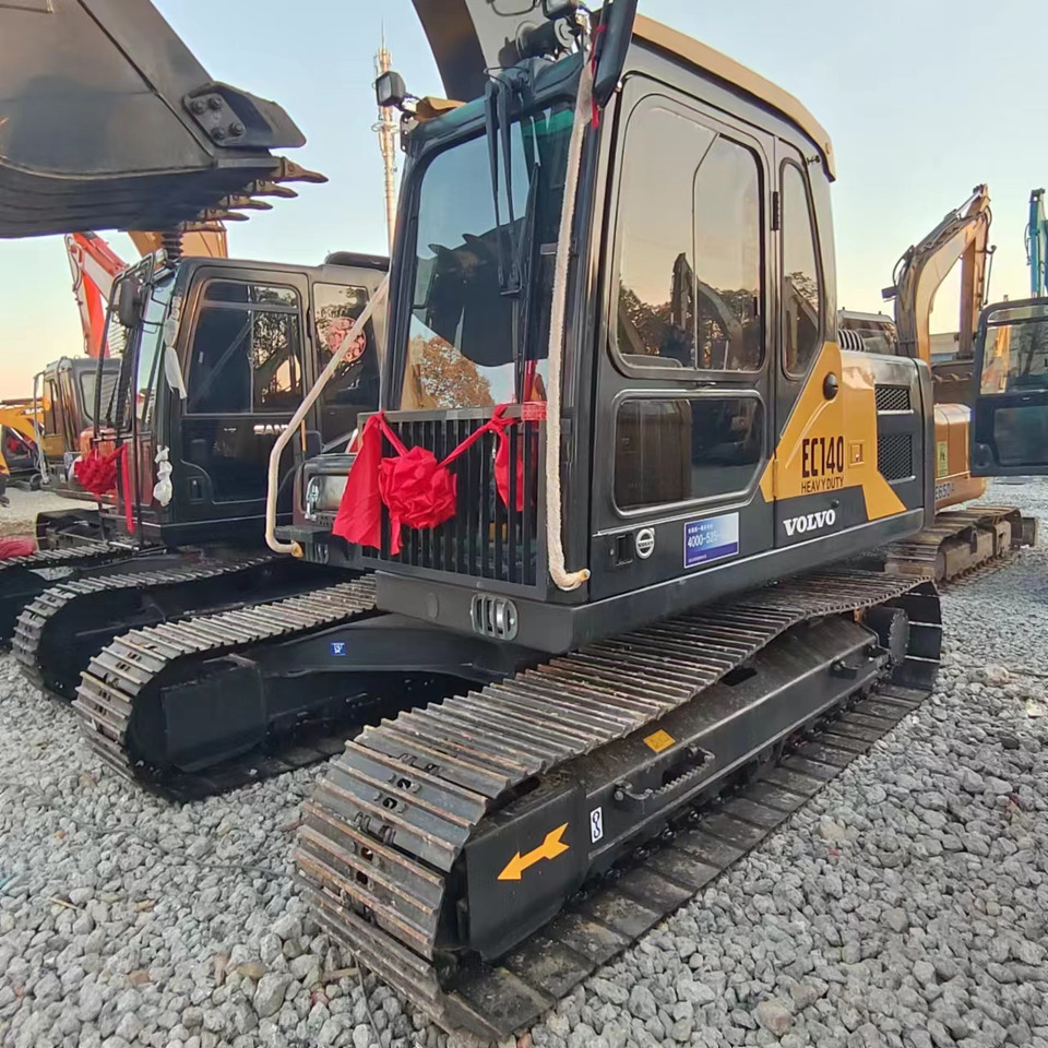 Ekskavator perayap VOLVO EC140: gambar 12