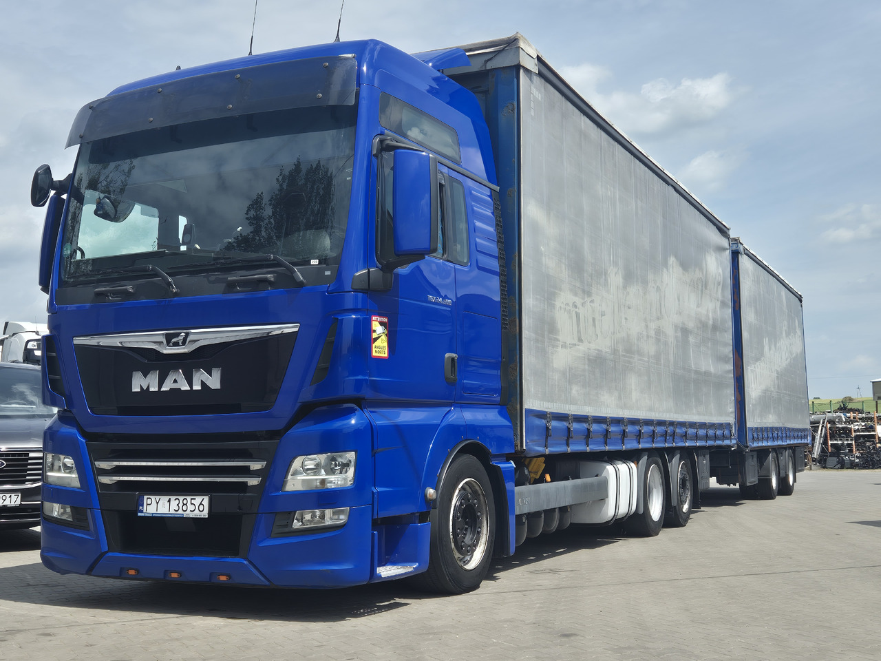 MAN tgx 24,500 - Truk dengan terpal samping: gambar 1 MAN tgx 24,500 - Truk dengan terpal samping: gambar 1