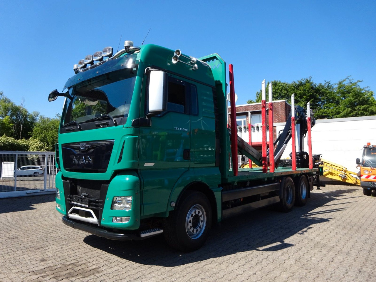 MAN 33.560 TGX mit TAJFUN L150Z Holzladekran 6x4 - Truk logging, Truk derek: gambar 2 MAN 33.560 TGX mit TAJFUN L150Z Holzladekran 6x4 - Truk logging, Truk derek: gambar 2