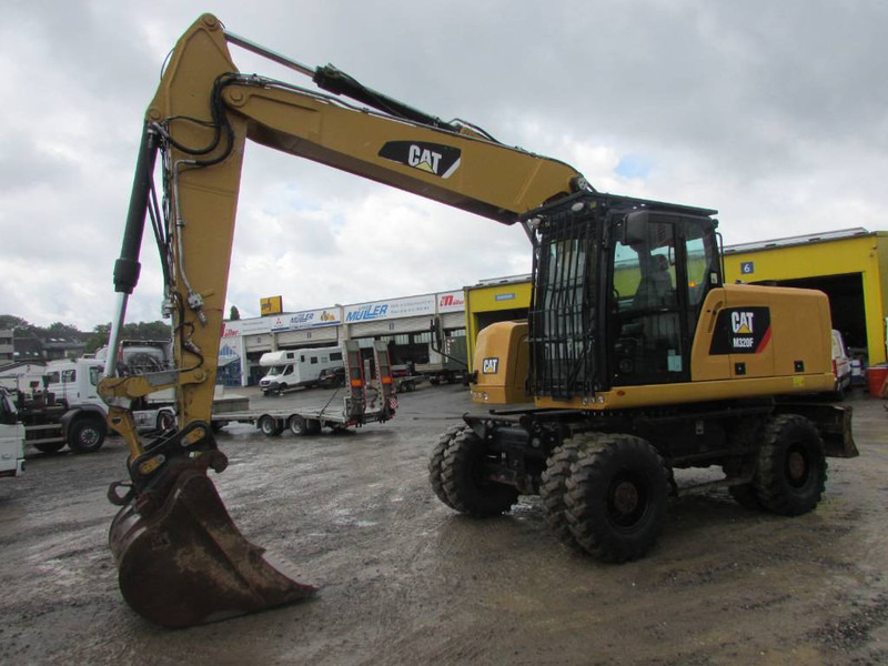 Cat M 320 F Mobilbagger 69.500 EUR / AC - Ekskavator roda: gambar 1 Cat M 320 F Mobilbagger 69.500 EUR / AC - Ekskavator roda: gambar 1