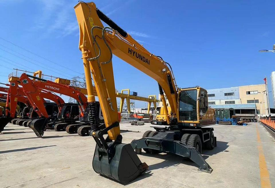 Hyundai 210W-9 - Ekskavator roda: gambar 1 Hyundai 210W-9 - Ekskavator roda: gambar 1