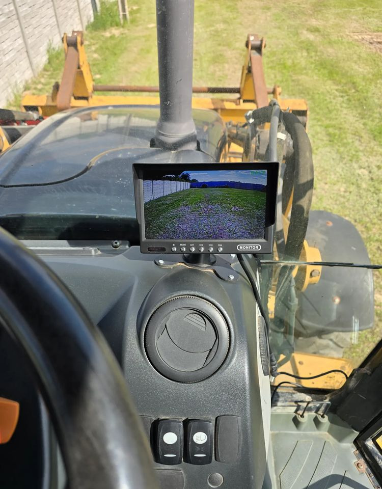 Backhoe loader Caterpillar: gambar 10